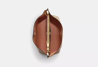 Mollie Bucket Bag 22 In Signature Canvas