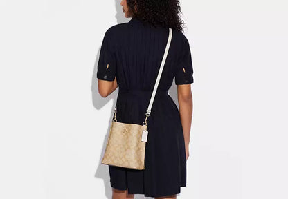 Mollie Bucket Bag 22 In Signature Canvas