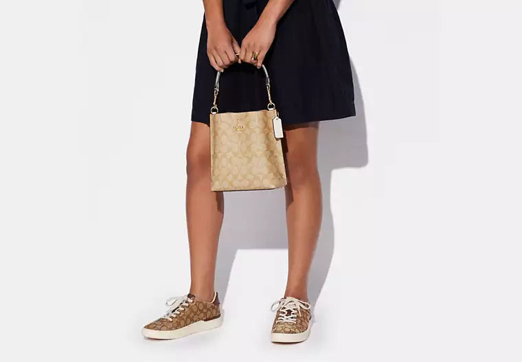 Mollie Bucket Bag 22 In Signature Canvas