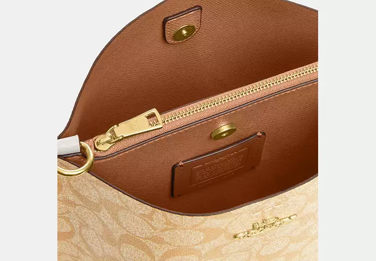 Mollie Bucket Bag 22 In Signature Canvas
