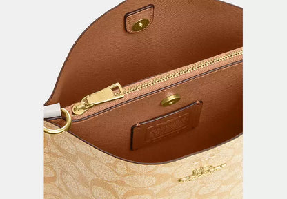 Mollie Bucket Bag 22 In Signature Canvas